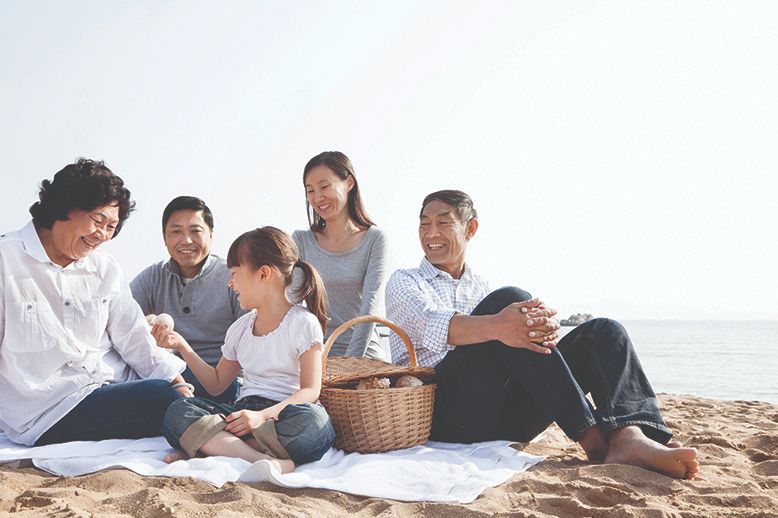asian family on the beach