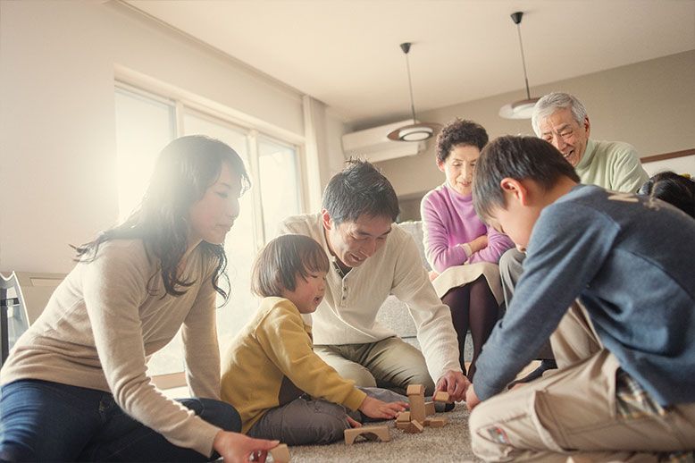 multi generational family playing