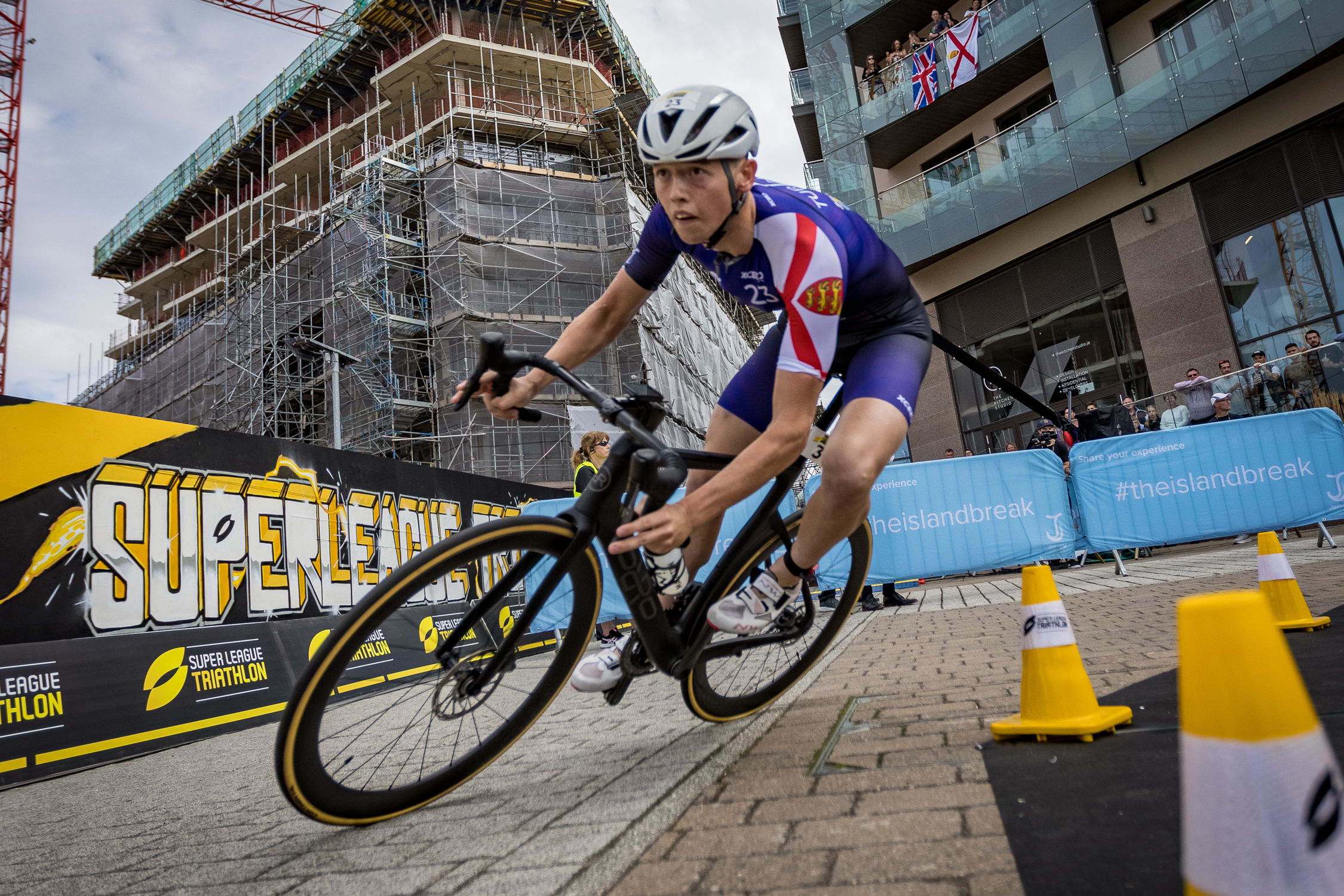 competitive cyclist racing through city street course