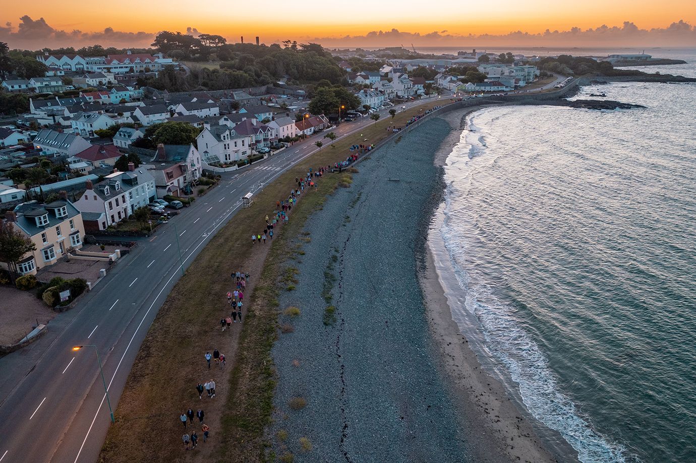 Photo is an aerial view of the RBC Walk of Hope along a coastline