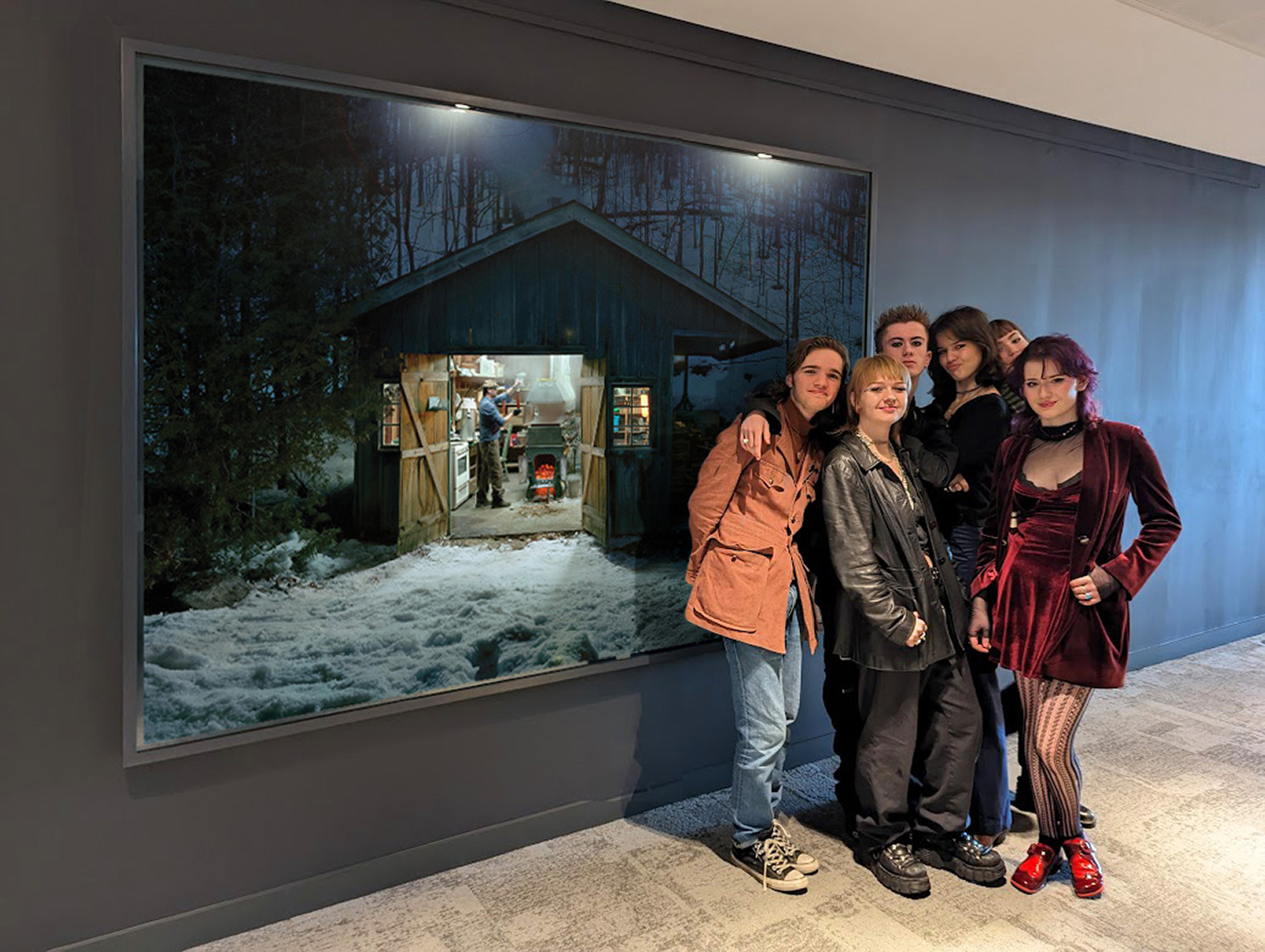 Photo of the BRIT School students infront of Scott McFarland's Sugar Shack art piece