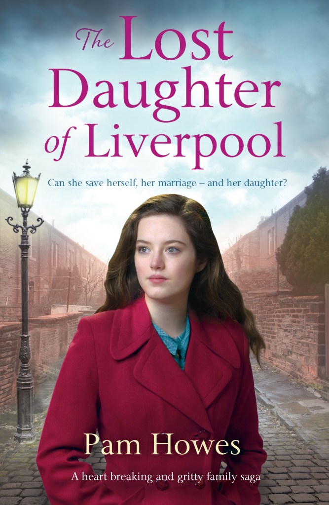 Book cover of The Lost Daughter of Liverpool by Pam Howes. A young woman with long dark hair and a serious expression stands in a narrow cobblestone alley lined with brick terraced houses. She wears a red double-breasted coat over a teal blouse. A vintage ornate street lamp stands to her left, and an overcast sky looms above. The title is displayed in large magenta script at the top, with the tagline "Can she save herself, her marriage – and her daughter?" below it. The author's name appears in gold at the bottom, above the descriptor "A heart breaking and gritty family saga."