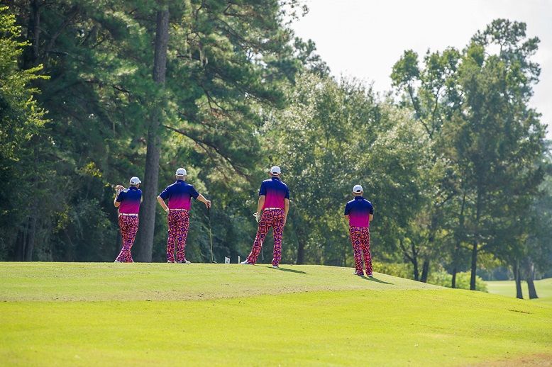 four golfers in same clothes