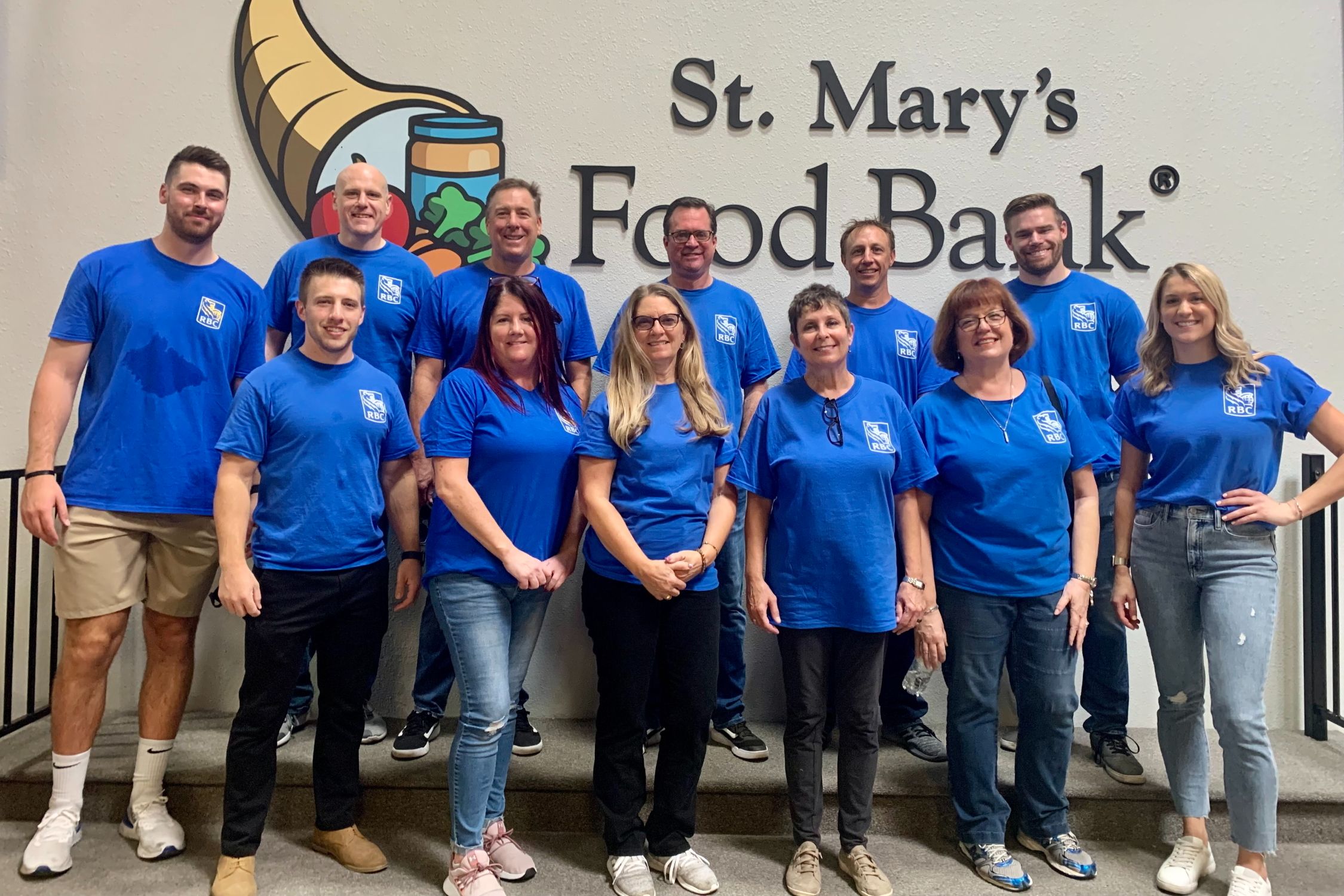 Photo of Phoenix employees volunteering together at a local food bank in 2021.