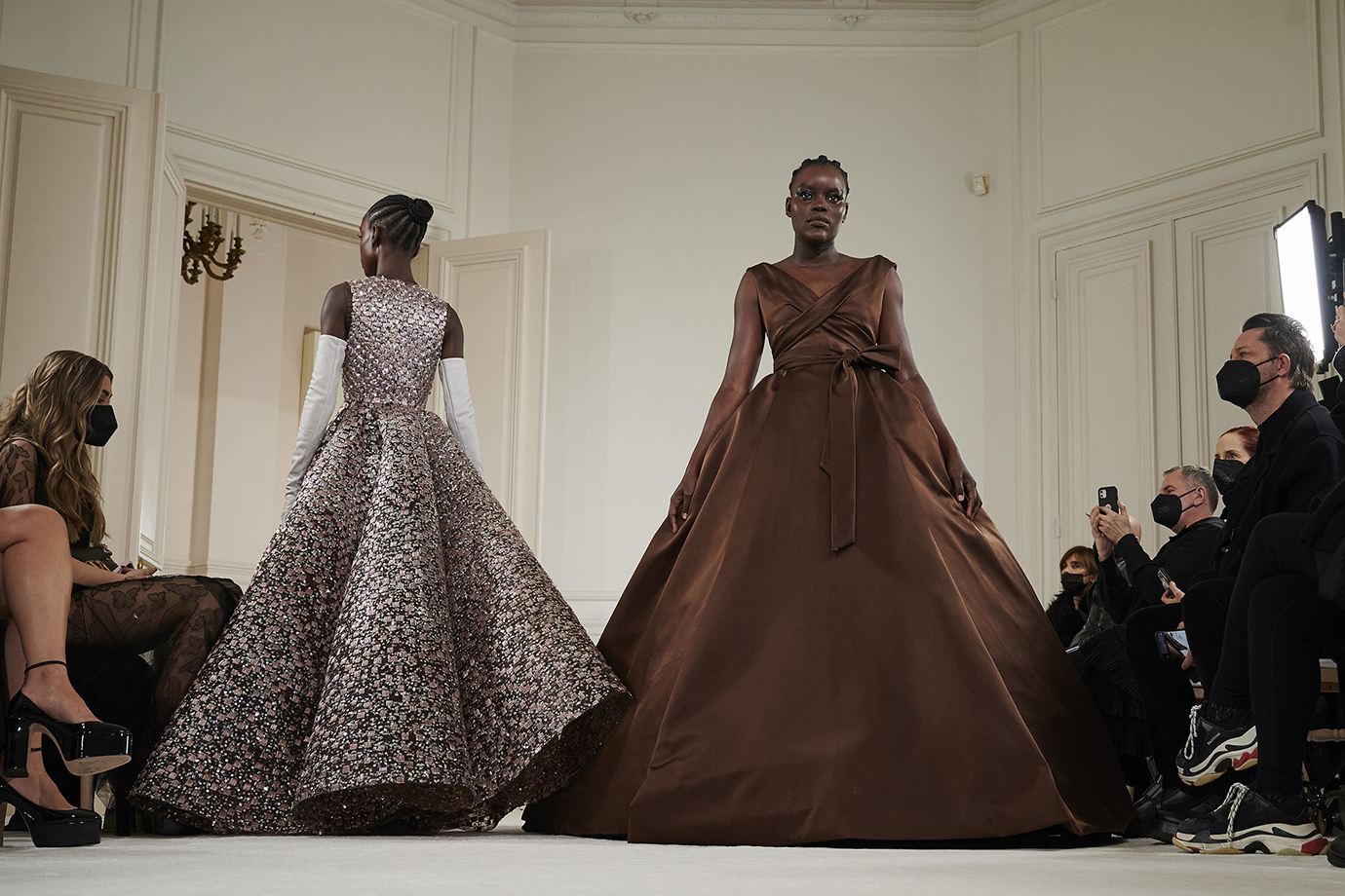Photo of model walking the runway during Valentino haute couture show