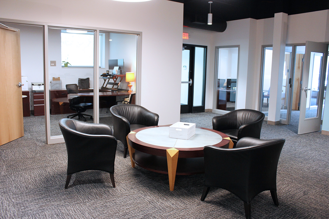 Photo of chairs and other donated furniture items in Simpson Housing Service's entrance lobby.