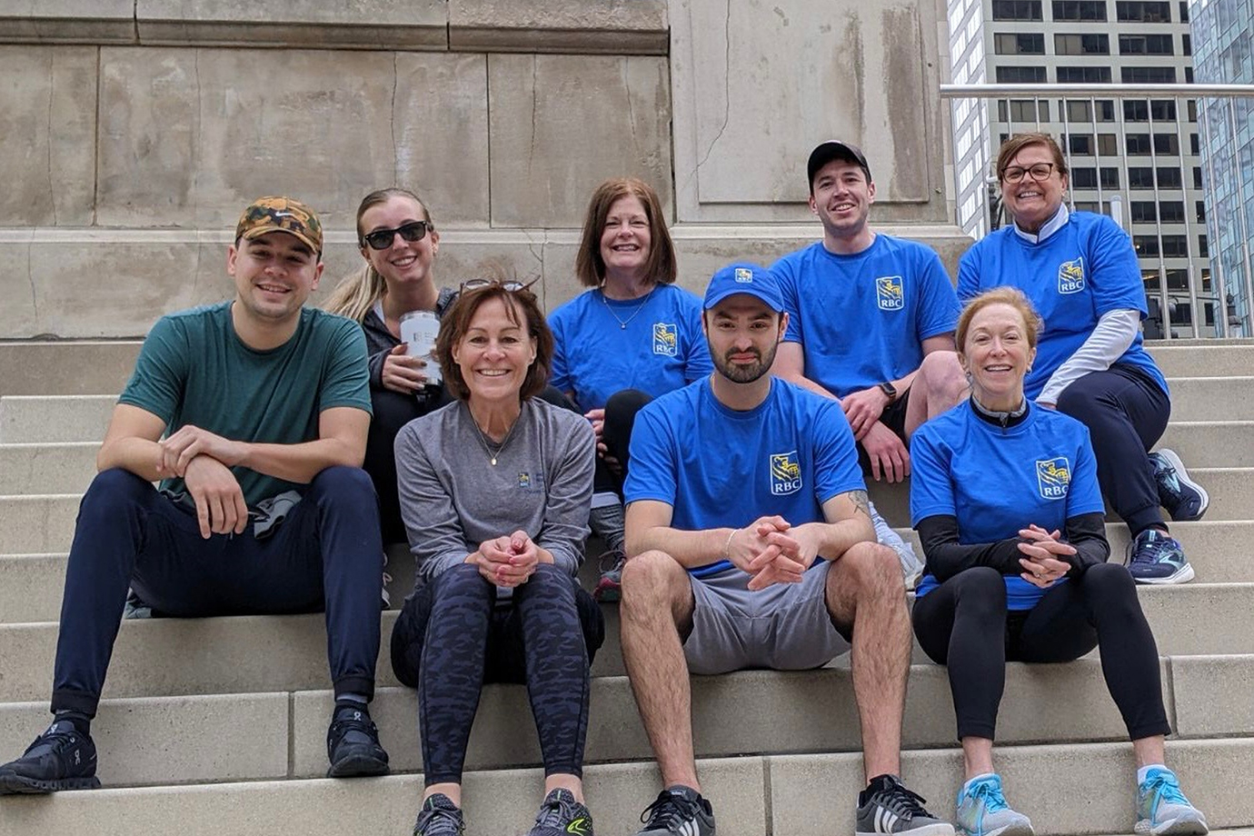 Photo of award recipient, Diane Weber, top right, at a stair climb fundraiser she organized with Chicago workers.