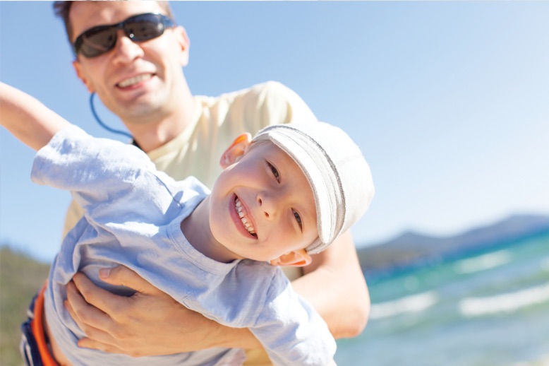 father son on beach