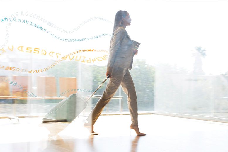 woman walking with suitcase