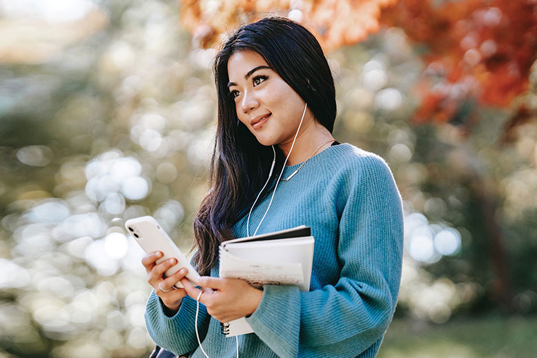 young asian woman with headphones