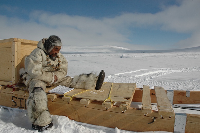 arctic scene with man from The Journals of Knud Rasmussen